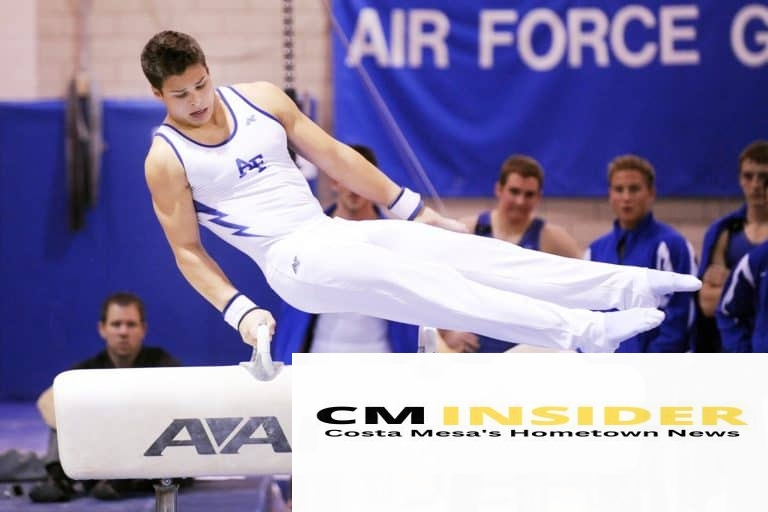 man wearing white and blue shirt jumping on white avai table