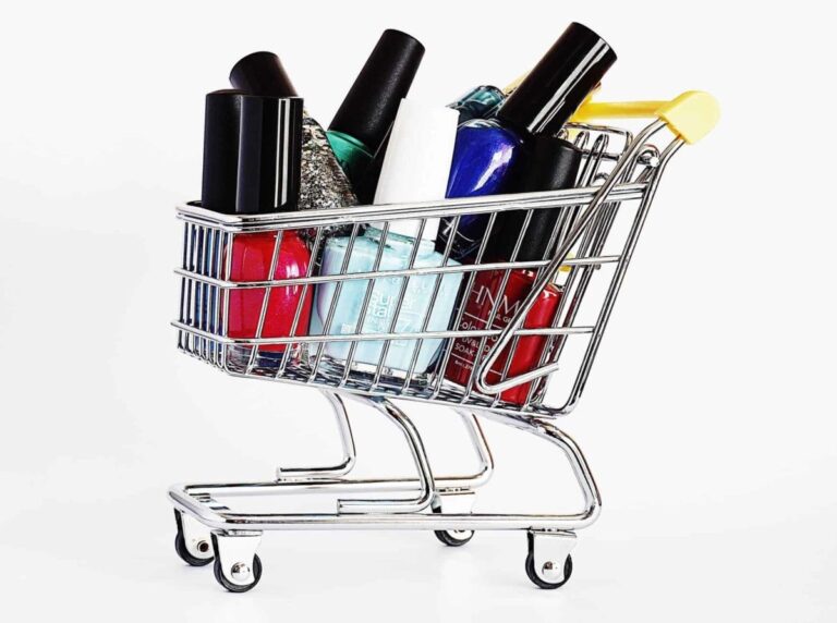 stainless steel mini shopping cart with nail polish bottles