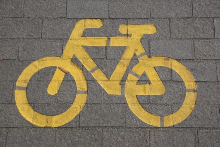 bicycle lane on gray concrete road