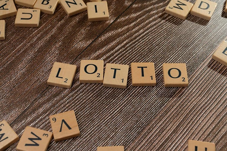 lottery scrabble letters on a wooden table