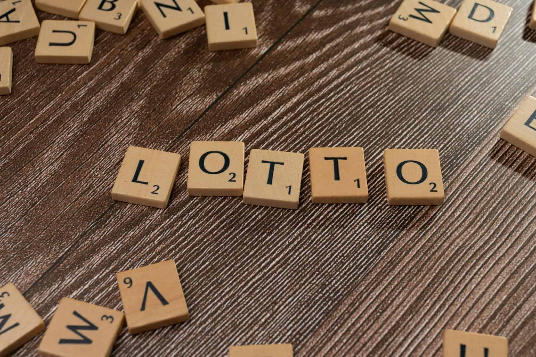 lottery scrabble letters on a wooden table